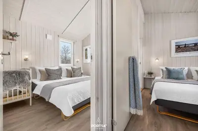 Ein Bett oder Betten in einem Zimmer der Unterkunft Ferienhaus Sonnenberg - Sankt Andreasberg im Harz