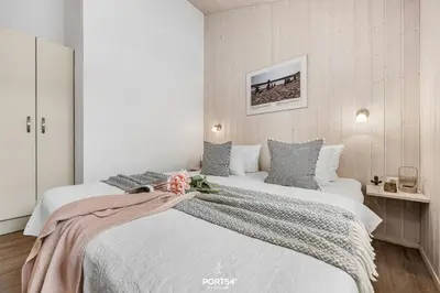 Ein Bett oder Betten in einem Zimmer der Unterkunft Ferienhaus Wurmberg - Sankt Andreasberg im Harz