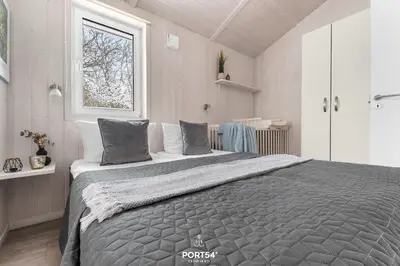 Ein Bett oder Betten in einem Zimmer der Unterkunft Ferienhaus Bachgeflüster - Sankt Andreasberg im Harz