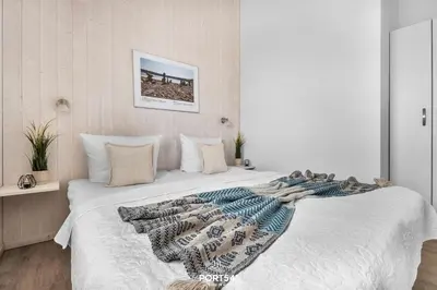 Ein Bett oder Betten in einem Zimmer der Unterkunft Ferienhaus Blocksberg - Sankt Andreasberg im Harz