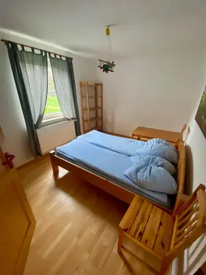 Ein Bett oder Betten in einem Zimmer der Unterkunft Rollstuhlgerechter Ferienbungalow in ruhiger Lage