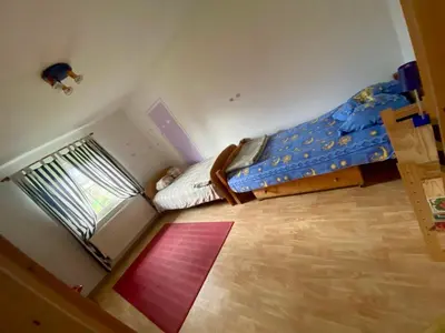 Ein Bett oder Betten in einem Zimmer der Unterkunft Rollstuhlgerechter Ferienbungalow in ruhiger Lage