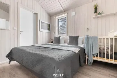 Ein Bett oder Betten in einem Zimmer der Unterkunft Ferienhaus GLÜCK AUF - Sankt Andreasberg im Harz