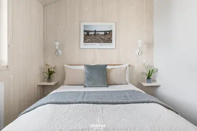 Ein Bett oder Betten in einem Zimmer der Unterkunft Ferienhaus Platzhirsch - Sankt Andreasberg im Harz