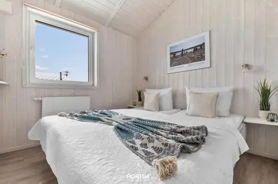 Ein Bett oder Betten in einem Zimmer der Unterkunft Ferienhaus Panorama-Traum 47 - Sankt Andreasberg im Harz