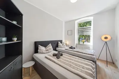 Ein Bett oder Betten in einem Zimmer der Unterkunft Schöne FeWo im EG mit Hof, für 4 Personen