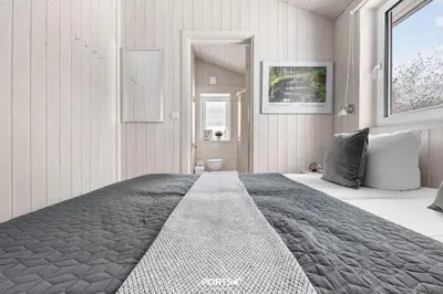 Ein Bett oder Betten in einem Zimmer der Unterkunft Ferienhaus Bergkristall - Sankt Andreasberg im Harz