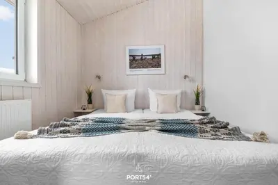 Ein Bett oder Betten in einem Zimmer der Unterkunft Ferienhaus Panoramapark 39 - Sankt Andreasberg im Harz