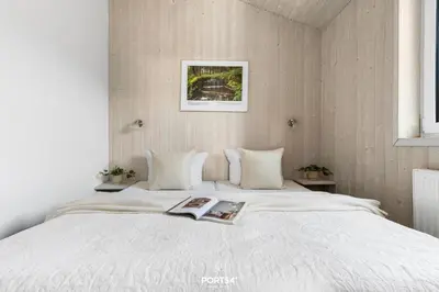 Ein Bett oder Betten in einem Zimmer der Unterkunft Ferienhaus Spitzenblick 2 - Sankt Andreasberg im Harz