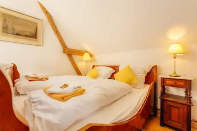 Ein Bett oder Betten in einem Zimmer der Unterkunft Ferienhaus- Gruppenunterkunft mit Festsaal, Frühstück, Halbpension extra buchbar