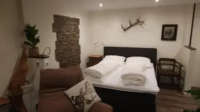 Ein Bett oder Betten in einem Zimmer der Unterkunft Wildwechsel