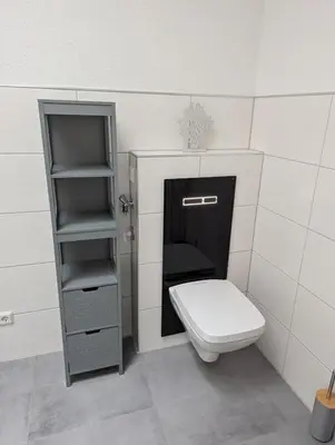 Ein Badezimmer in der Unterkunft DesignSuite