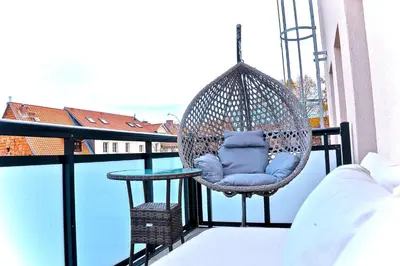 Ein Balkon oder eine Terrasse in der Unterkunft DesignSuite