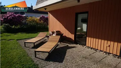 Ein Garten an der Unterkunft Schulenberg-Apartment 1 mit Kamin