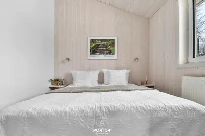 Ein Bett oder Betten in einem Zimmer der Unterkunft Ferienhaus Panoramablick 11 - Sankt Andreasberg im Harz