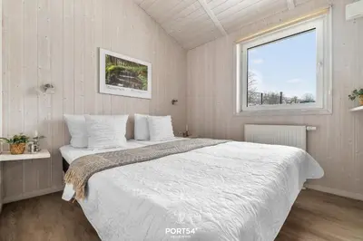Ein Bett oder Betten in einem Zimmer der Unterkunft Ferienhaus Panoramablick 11 - Sankt Andreasberg im Harz