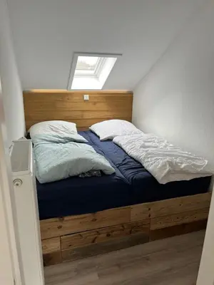 Ein Bett oder Betten in einem Zimmer der Unterkunft Harzhaus Altenau - Wohnung 3