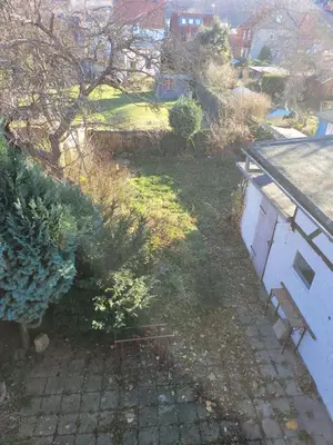 Ein Garten an der Unterkunft Günstige, große Ferienwohnung im Zentrum von Wernigerode