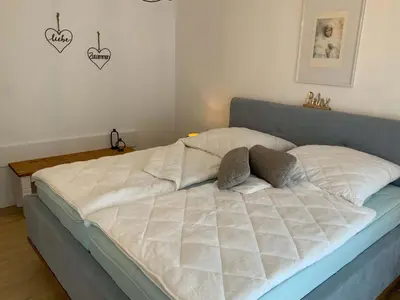 Ein Bett oder Betten in einem Zimmer der Unterkunft Ferienwohnung Traum an der Radau