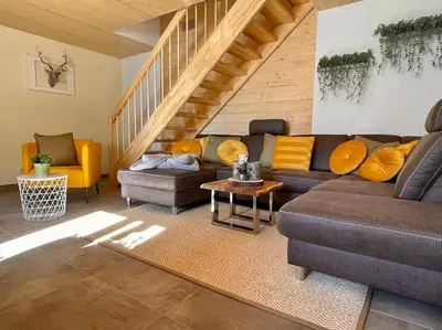 Ein Sitzbereich in der Unterkunft Ferienhaus Christel