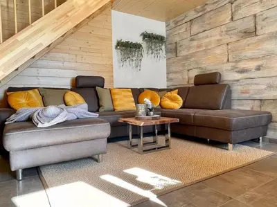 Ein Sitzbereich in der Unterkunft Ferienhaus Christel