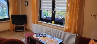 Ein Sitzbereich in der Unterkunft FeWo Harz Haennig 1