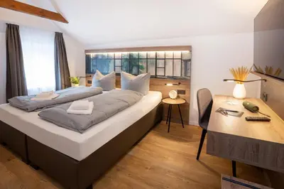 Ein Bett oder Betten in einem Zimmer der Unterkunft Lieblingsquartier Wohnung 12