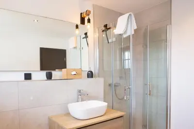 Ein Badezimmer in der Unterkunft Chalet Bergzeit 5