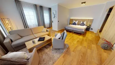 Ein Bett oder Betten in einem Zimmer der Unterkunft Chalet Bergzeit 5