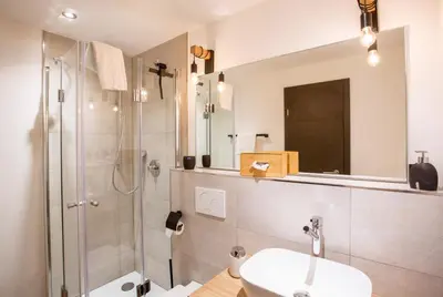 Ein Badezimmer in der Unterkunft Chalet Bergzeit 3