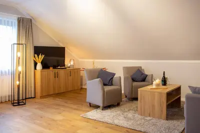 Ein Sitzbereich in der Unterkunft Chalet Bergzeit 3