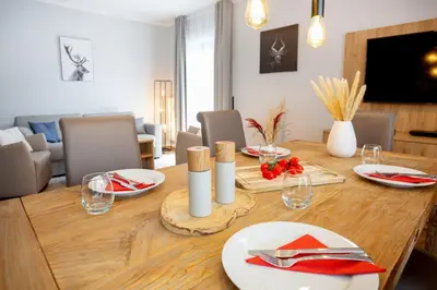 Ein Sitzbereich in der Unterkunft Chalet Bergzeit 7