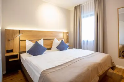 Ein Bett oder Betten in einem Zimmer der Unterkunft Chalet Bergzeit 4