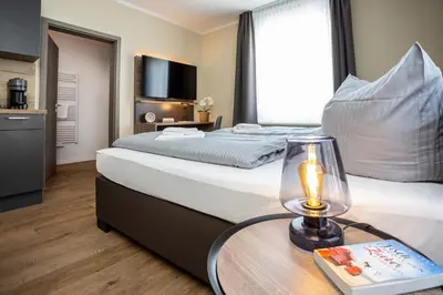 Ein Bett oder Betten in einem Zimmer der Unterkunft Lieblingsquartier Studio 4