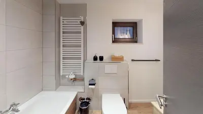 Ein Badezimmer in der Unterkunft Chalet Bergzeit komplett