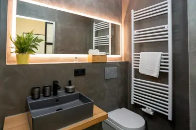Ein Badezimmer in der Unterkunft LQ familiy Suite 4 5