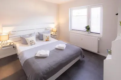 Ein Bett oder Betten in einem Zimmer der Unterkunft Ferienhaus zur Brockenoase Saunahaus