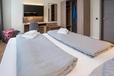 Ein Bett oder Betten in einem Zimmer der Unterkunft Lieblingsquartier - Wohnung 3