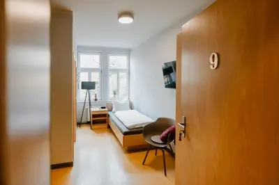 Ein Bett oder Betten in einem Zimmer der Unterkunft Am großen Bleek Villa Gartenblick