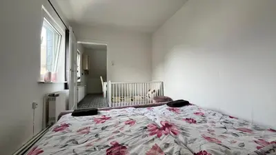 Ein Bett oder Betten in einem Zimmer der Unterkunft Ferienwohnung Harzgebirge