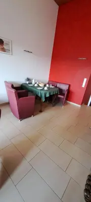 Ein Sitzbereich in der Unterkunft Suite Rübezahl