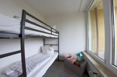 Ein Bett oder Betten in einem Zimmer der Unterkunft Apartment 412
