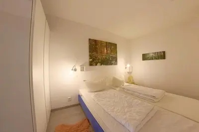 Ein Bett oder Betten in einem Zimmer der Unterkunft Apartment 412