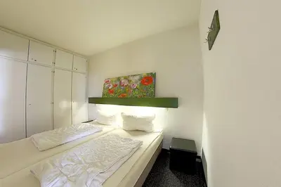 Ein Bett oder Betten in einem Zimmer der Unterkunft Apartment 474