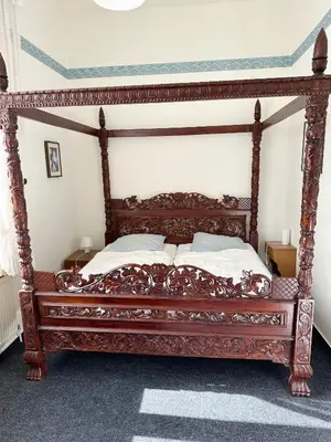 Ein Bett oder Betten in einem Zimmer der Unterkunft Villa Teufelsmauer