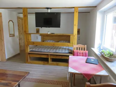 Ein Bett oder Betten in einem Zimmer der Unterkunft Ferienhaus Diana in Thale OT Altenbrak