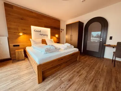 Ein Bett oder Betten in einem Zimmer der Unterkunft Baude IV