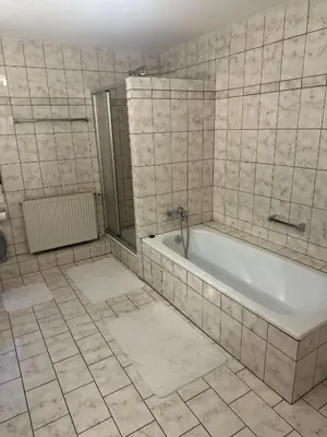 Ein Badezimmer in der Unterkunft Ferienwohnung 1 Berliner Platz