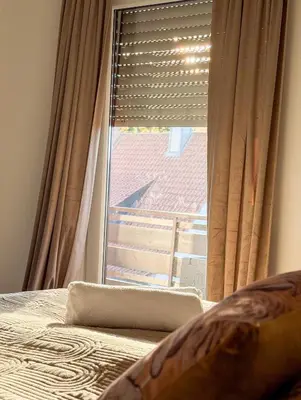 Ein Bett oder Betten in einem Zimmer der Unterkunft FeWo DT ''Bismarck'' mit traumhafter Balkonaussicht