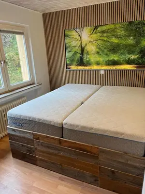 Ein Bett oder Betten in einem Zimmer der Unterkunft Harzhaus Altenau - Wohnung 2